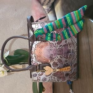 Engraved leather satchel